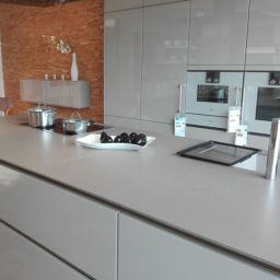 Premium Dolphin Grey Granite Slab shown on kitchen countertops and kitchen cupboards