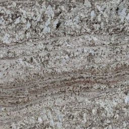 Torroncino Granite - splashes of brown, white and cream colours